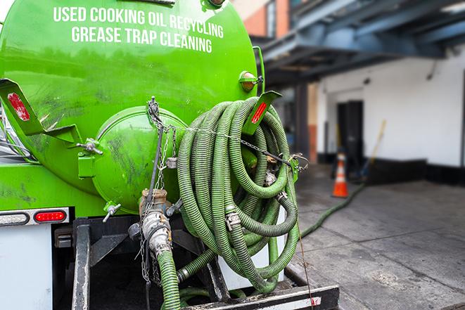 pumping out excess grease and waste from a restaurant's trap in Edmonds WA